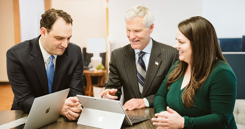 Merchant Mcintyre meeting with a client